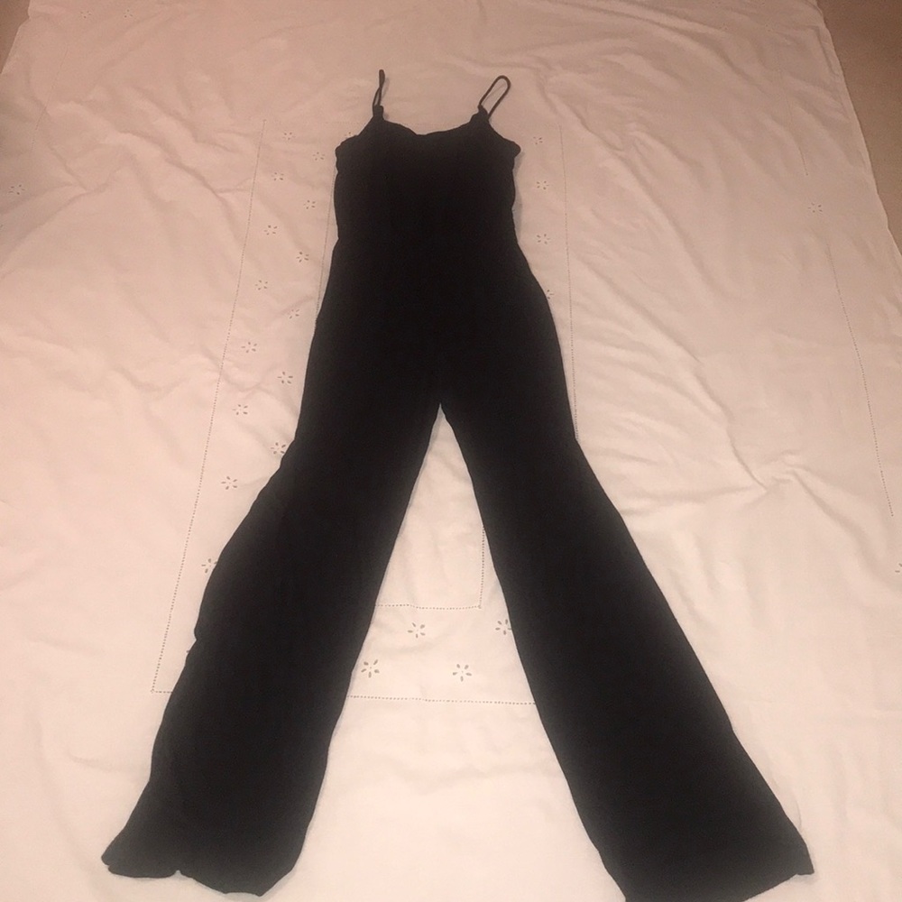 Black sleeveless jumpsuit